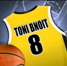 a yellow jersey with the name toni bnoit on it