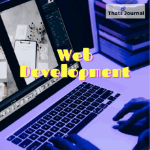 a person is typing on a laptop with the words web development on the screen