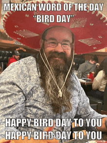 a man with a beard wearing a sombrero with the words " mexican word of the day bird day "