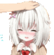 a person is petting a girl 's head .