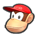 a cartoon monkey wearing a red hat and smiling .