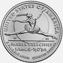 a silver coin from the united states of america has a ballerina on it