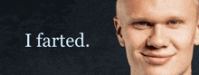 a close up of a man 's face with the words `` i farted '' written on it .