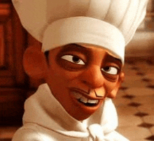 a close up of a cartoon chef wearing a white hat and smiling .