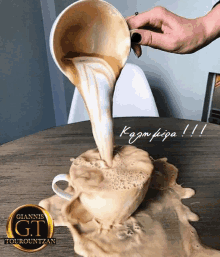 a person pouring a cup of coffee with the words giannis gt tourountzan