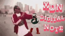 a man in a red jacket is dancing with a mascot and the words xdn digital note above him