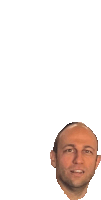 a bald man 's head is shown with a white background