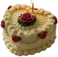 a heart shaped birthday cake with a red rose on top and a lit candle