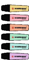 six different colored stabilo boss markers are lined up on a white background