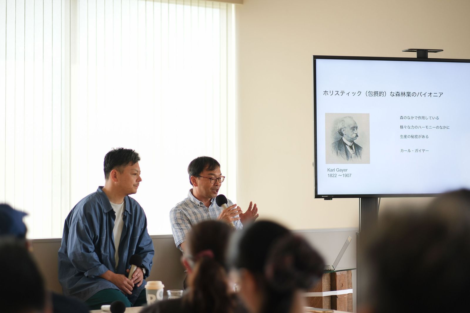 建築プロジェクト「KANSO」のメンバーである秋田在住の建築士・佐藤欣裕（写真左）と、森林環境コンサルタント・池田憲昭（写真右）。