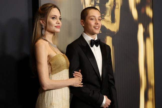 Angelina Jolie and Knox Jolie-Pitt attend the Academy of Motion Picture Arts and Sciences 15th Governors Awards at the Ray Dolby Ballroom in Los Angeles, California, U.S. November 17, 2024. REUTERS/Mario Anzuoni