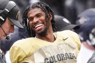 Shedeur Sanders has a laugh during a Colorado spring practice in late April.