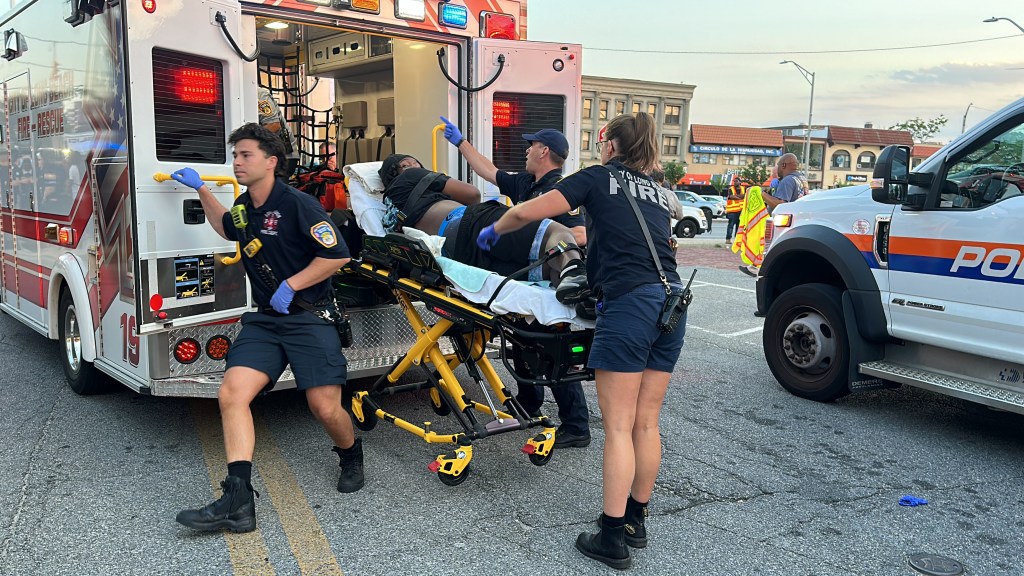 Loading a person into an ambulance