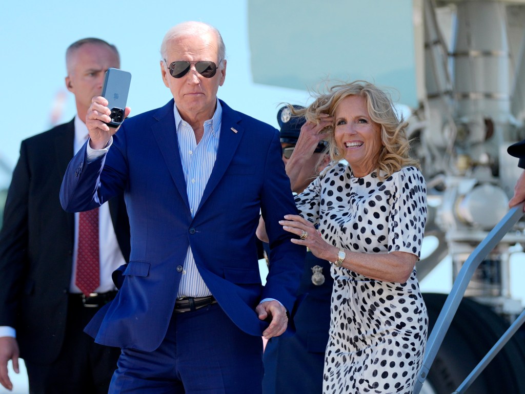 President Joe Biden, left, and first lady Jill Biden arrive at John F. Kennedy International Airport, Friday, June 28, 2024.