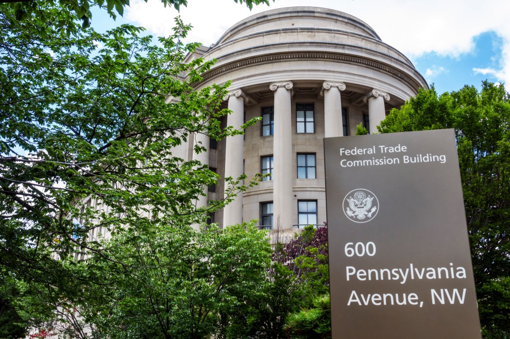 Exterior view of the Federal Trade Commission building with its sign in Washington DC