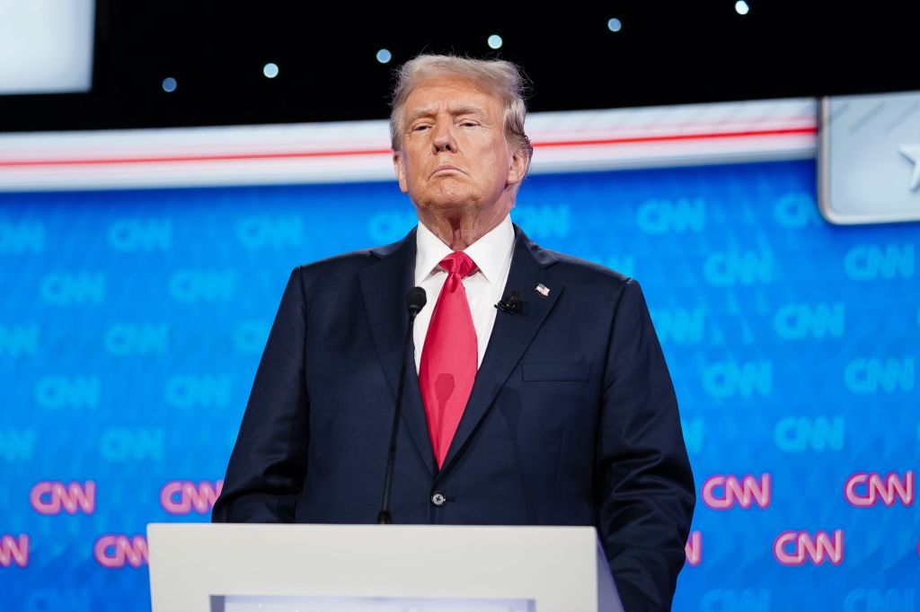 Former President Donald Trump stands on the stage during a break in the CNN presidential election debate against President Joe Biden in Atlanta, Georgia on Thursday, June 27, 2024.