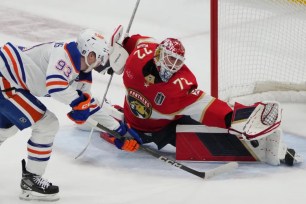 Sergei Bobrovsky, who made 32 saves, makes a save on Ryan Nugent-Hopkins during the first period of the Panthers' 3-0 win over the Oilers in Game 1 of the Stanley Cup Final.