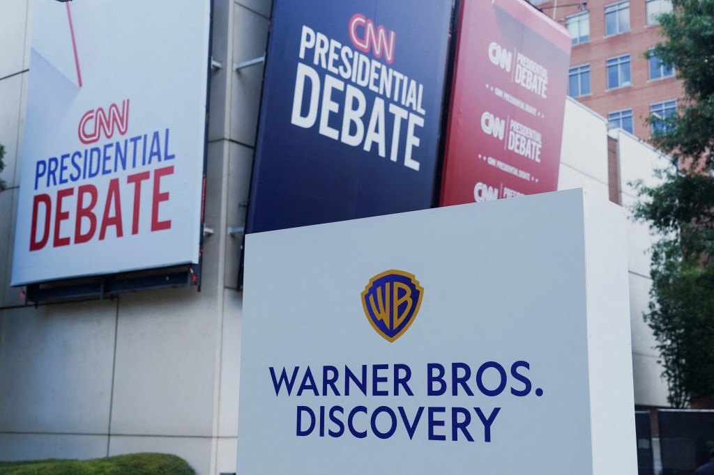 Signs promoting the debate between U.S. President Joe Biden and his rival Donald Trump are erected around the venue at CNN Center in Atlanta, Georgia