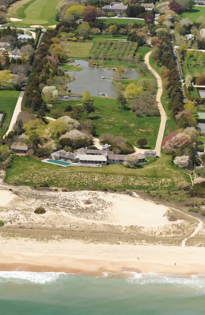 A large green field with trees surrounding Rosenstein's luxurious mansion, the most expensive residential property in the country.