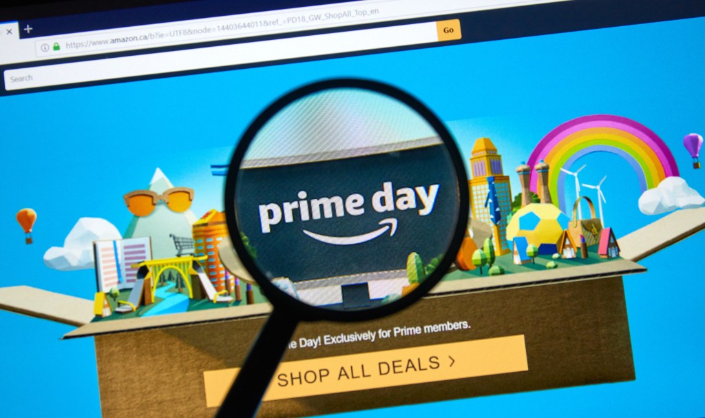 MONTREAL, CANADA - JUNE 9, 2019 : Amazon prime day page on official amazon site under magnifying glass. Amazon Prime Day is the retailer's big members-only summer sale in month of July each year.