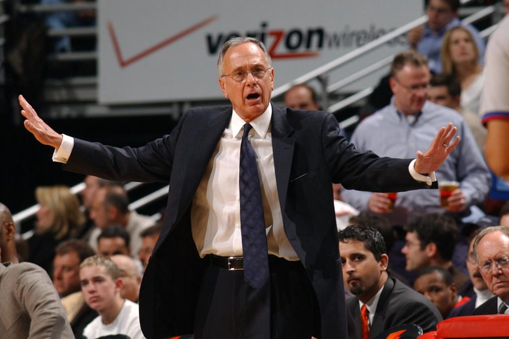 Head coach Larry Brown of the Detroit Pistons argues a call with referee Tony Brothers #25 during a game against the Chicago Bulls on February 25, 2004 at the United Center in Chicago, Illinois. The Pistons defeated the Bulls 107-88. 