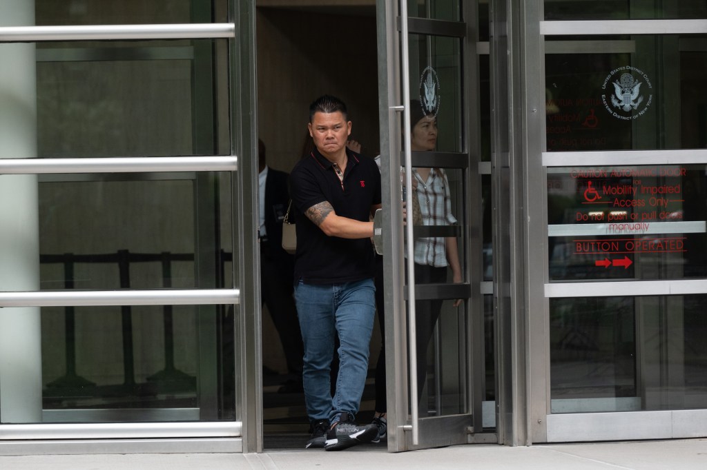 Long Phi Pham, who participated in the scheme with Porter and other gamblers, leaving Brooklyn Federal Court on June  6, 2024.