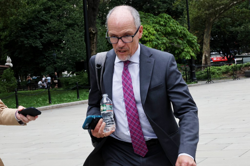 Biden aide Tom Perez alking in to City Hall for a meeting with Mayor Eric Adam