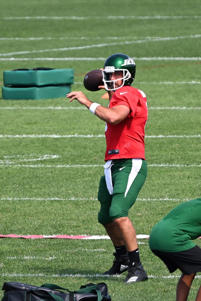 Jets quarterback Aaron Rodgers (8) throws a pass during practice at training camp in Florham Park, NJ.