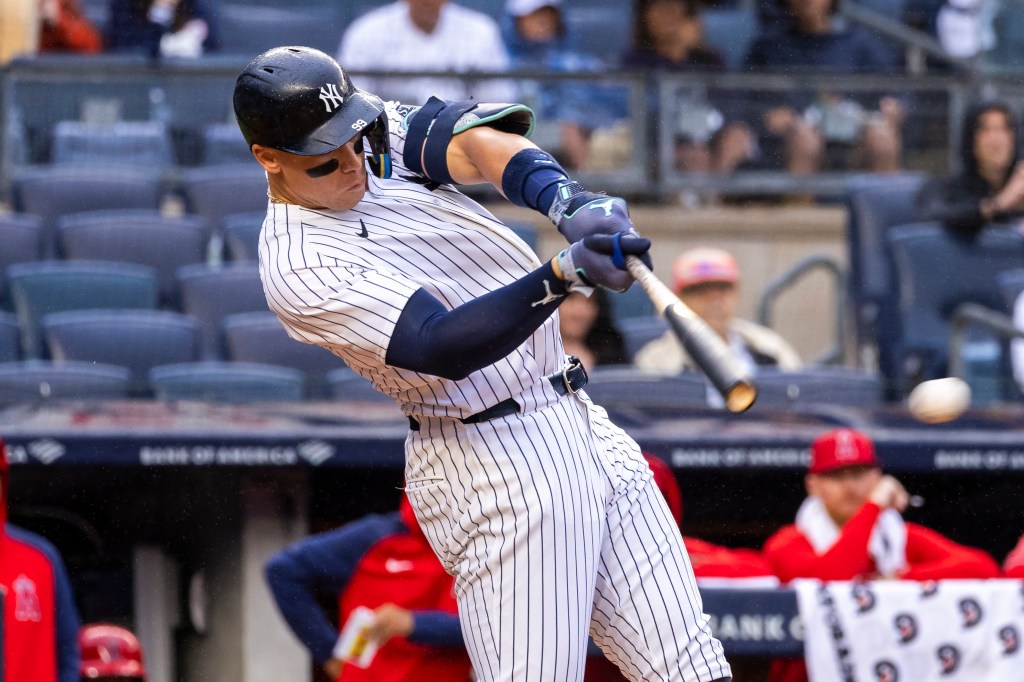 Aaron Judge hits a single in the fifth inning against the Los Angeles Angels.