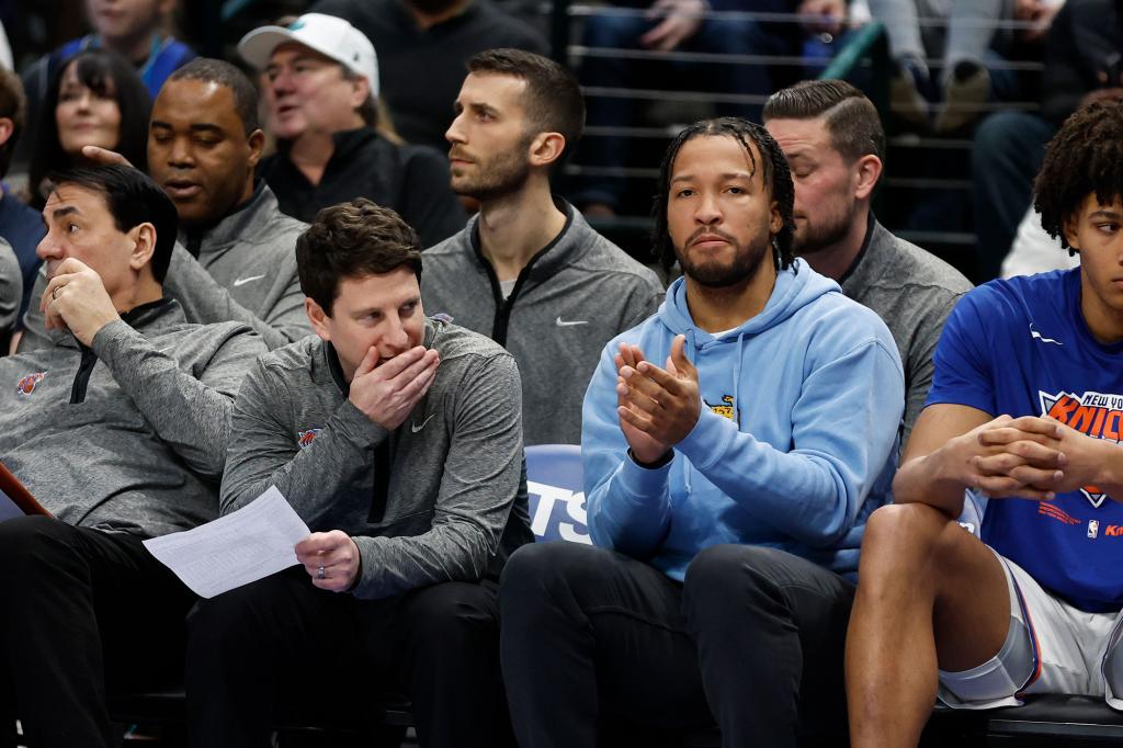 Jalen Brunson #11 of the New York Knicks on the bench during the second half against the Dallas Mavericks at American Airlines Center on December 27, 2022 in Dallas, Texas. NOTE TO USER: User expressly acknowledges and agrees that, by downloading and or using this photograph, User is consenting to the terms and conditions of the Getty Images License Agreement. (Photo by Tim Heitman/Getty Images)