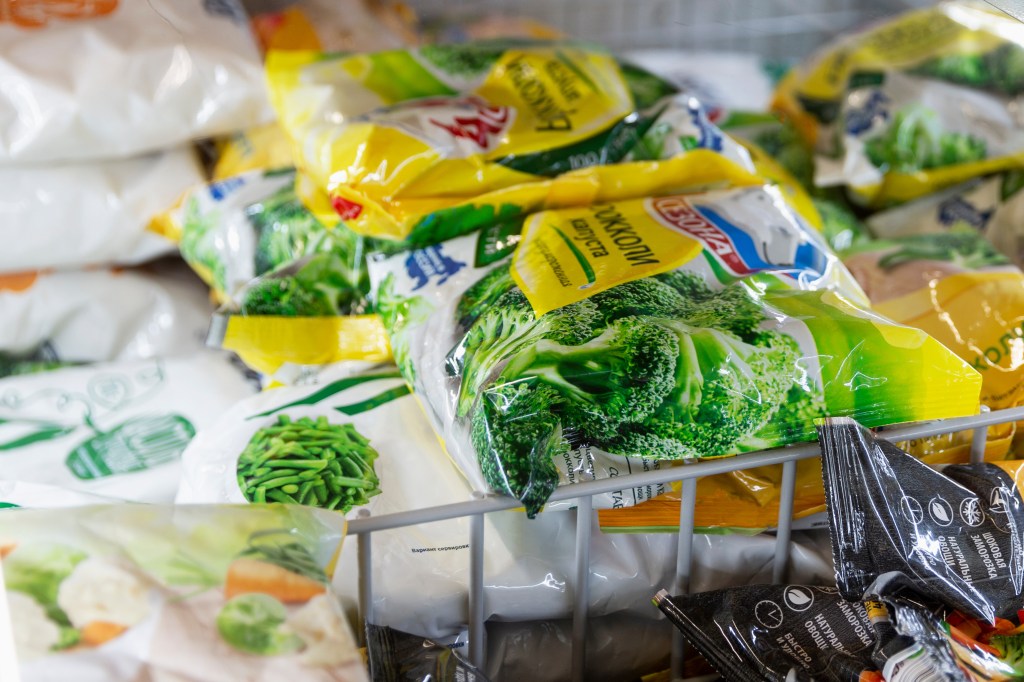 Bags of frozen broccoli in a store, Moscow, Russia, dated 01-01-2021