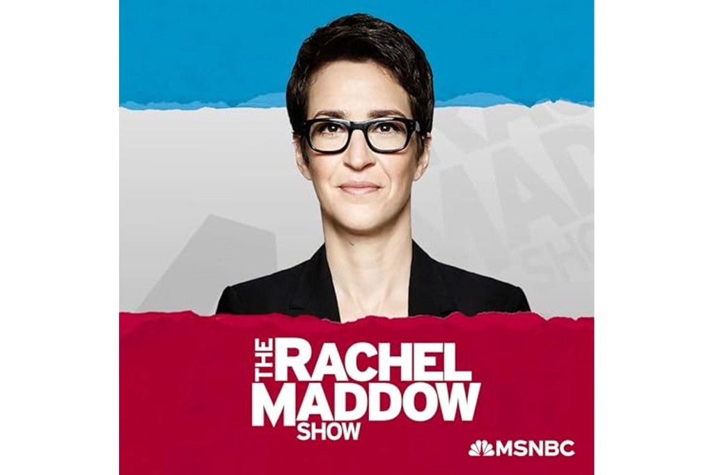 Rachel Maddow, a woman in glasses, against a red, white, and blue background