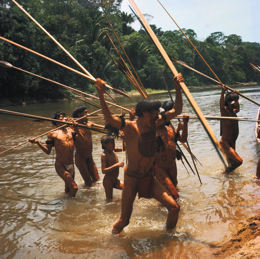 A group of armed Yanomami raiders from the Bisaasa-teri village in the Orinoco river.