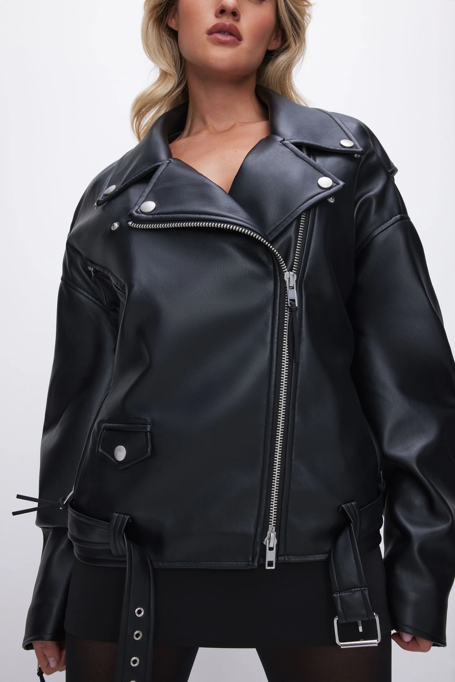 A model in a faux leather jacket