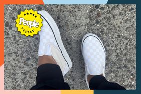 A closeup of a person's feet wearing one of the best slip-on shoes with a colorful border and People Tested badge.