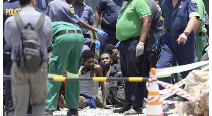 Dozens rescued, 15 bodies pulled from South Africa mine