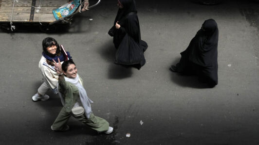 Young Iranians seen at the old bazaar in Tehran on June 13, 2024.