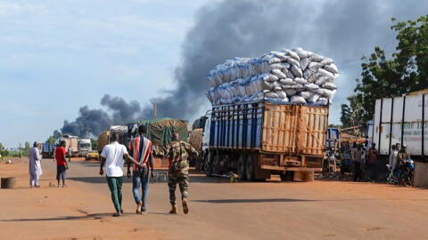 A screengrab from a video shows Malian security personnel detaining a suspect in the capital Bamako on September 17, 2024. 