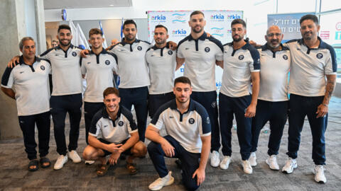 The Israeli men's judo team participating in the Paris 2024 Olympic and Paralympic Games pose before their flight to Paris, at Ben Gurion airport near Tel Aviv, July 22, 2024..