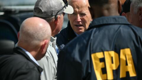 US President Joe Biden speaks with officials at Greenville-Spartanburg International Airport in Greer, South Carolina on October 2, 2024.