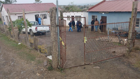 Police officials work at the scene of a mass shooting in Lusikisiki, South Africa September 28, 2024.