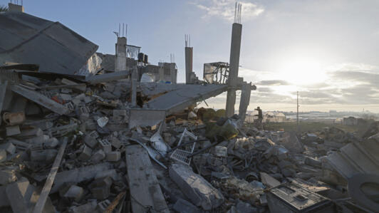 A man walks amid the debris of destroyed houses in the aftermath of Israeli bombardment in Rafah in the southern Gaza Strip on February 22, 2024.