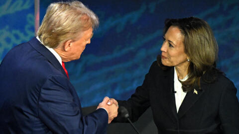 Kamala Harris shakes hands with Donald Trump during a presidential debate at the National Constitution Center in Philadelphia, Pennsylvania, on September 10, 2024.