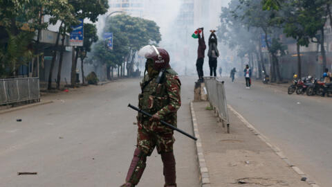 A riot police member walks, as protesters participate in an anti-government demonstration in Nairobi, Kenya, July 16, 2024.