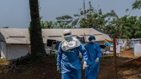 Two health workers in the mpox treatment centre in Kamituga, South Kivu in the east of the Democratic Republic of Congo on September 20, 2024.