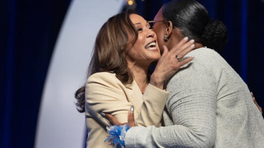 US Vice President Kamala Harris is introduced by the head of a Black sorority, Zeta Phi Beta, at the Indiana Convention Center on July 24, 2024.