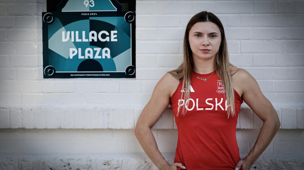 Polish Olympic athlete Krystsina Tsimanouskaya poses during a photo session at the Paris 2024 Olympic village, in Saint-Denis, on August 2, 2024.