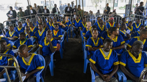 Those defendants in an alleged coup attempt in DR Congo with their lawyers, at the Ndolo military prison in Kinshasa June 7, 2024.