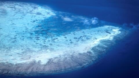 A coral atoll near Lizard Island on the Great Barrier Reef, located 270 kilometres (167 miles) north of the city of Cairns.