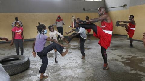 Students at Mathare North Boxing Club. Due to Covid-19, the club had to change the way training was carried out. Some students are seen with masks.